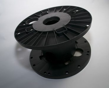 Injection moulded spool
