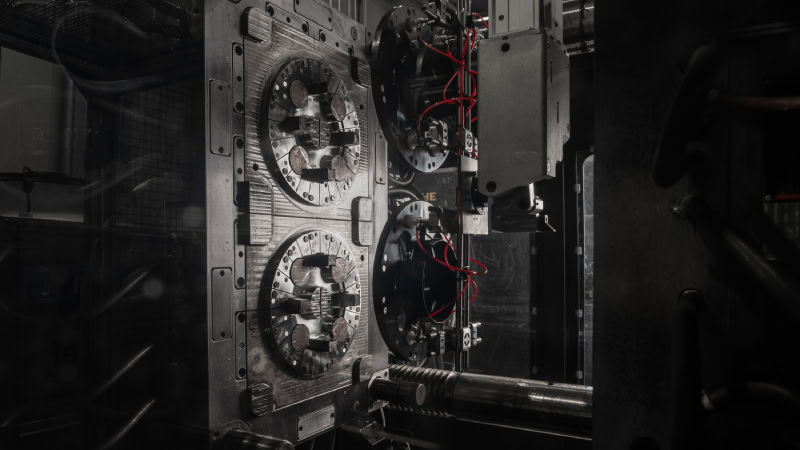 Injection mould tool in machine close up